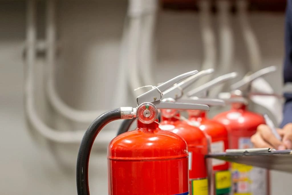 Fire Extinguishers undergoing examination