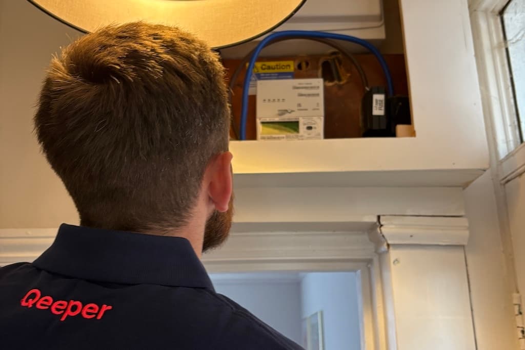 Electrician examining wires for faults